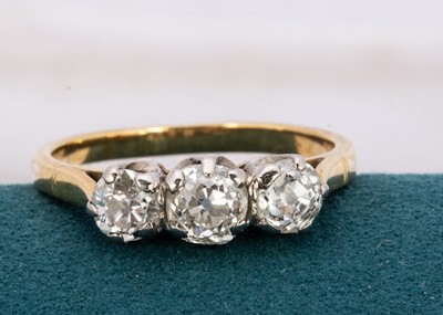 Lot 241 - A three stone old cut diamond platinum set dress ring