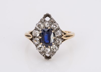 Lot 245 - A late 19th early 20th century navette shaped sapphire and diamond dress ring