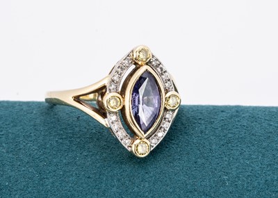 Lot 255 - An 18ct gold sapphire and diamond dress ring