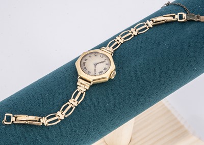 Lot 257 - An 18ct gold cased ladies wrist watch