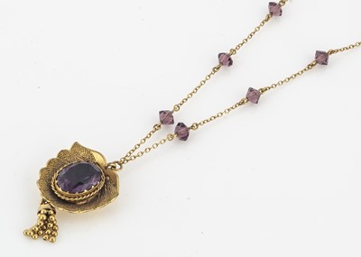 Lot 195 - A gold and amethyst drop pendant
