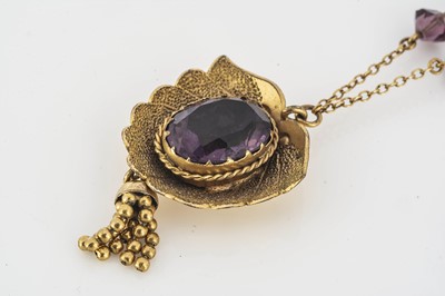 Lot 195 - A gold and amethyst drop pendant