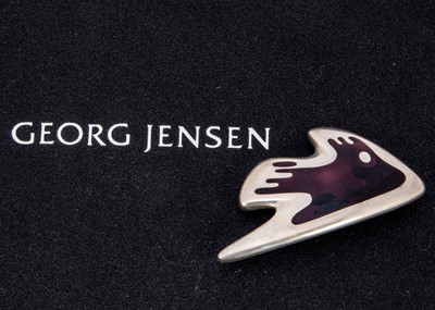 Lot 274 - Henning Koppel for Georg Jensen purple fish 307 silver brooch