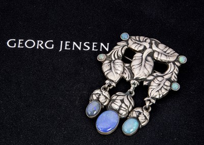 Lot 279 - An early 20th century Georg Jensen silver and opal brooch