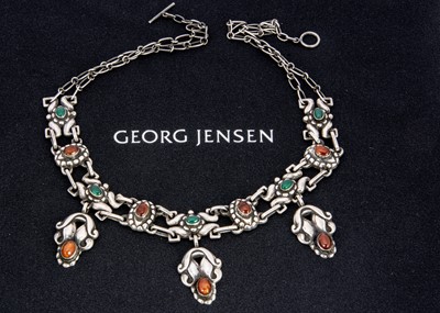 Lot 285 - An early Georg Jensen silver amber and chrysoprase fringe necklace no.14