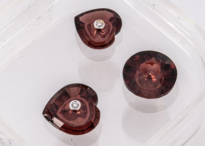 Lot 298 - Three certificated cut Garnets