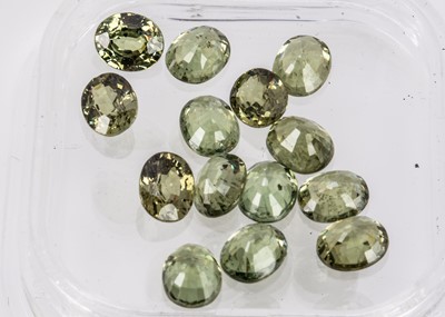 Lot 312 - Fourteen certificated Abanja Demantoid Garnets 