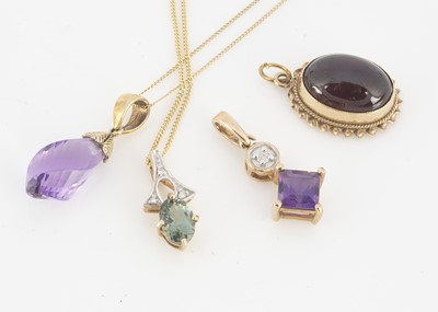 Lot 204 - Two gem set pendants and chains