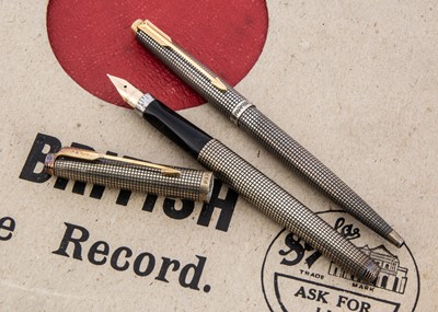 Lot 380 - Two Parker silver pens