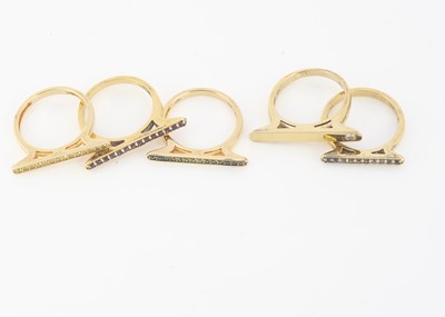 Lot 205 - A set of five silver gilt stacking rings