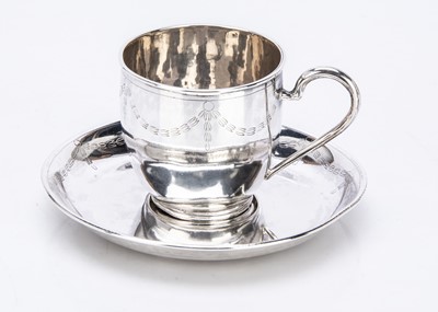 Lot 393 - An early 20th Century continental silver teacup and saucer