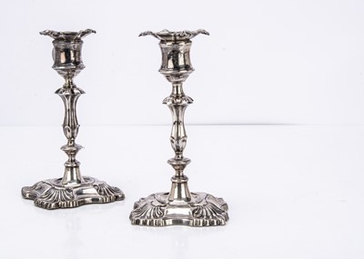 Lot 397 - A pair of Edwardian silver filled short candlesticks