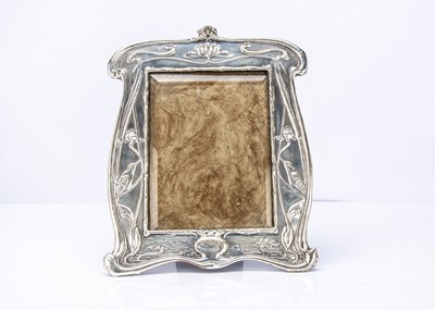 Lot 399 - An Arts & Crafts silver mounted photograph frame