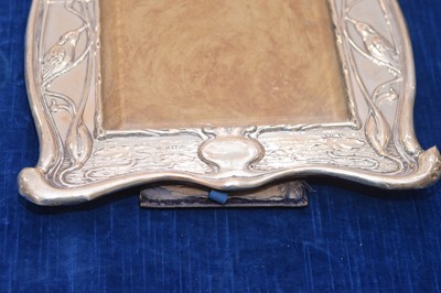 Lot 399 - An Arts & Crafts silver mounted photograph frame