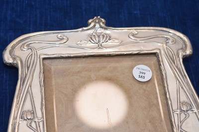 Lot 399 - An Arts & Crafts silver mounted photograph frame