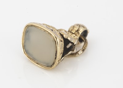 Lot 210 - An antique gilt metal and hardstone fob seal