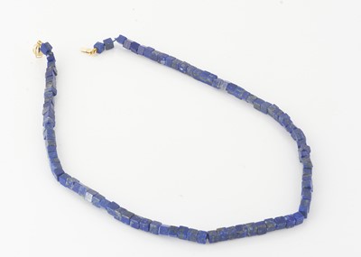 Lot 218 - A lapis lazuli and 9ct gold clasp necklace