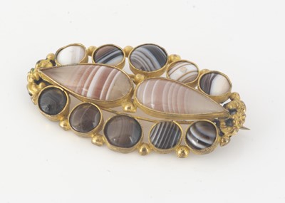 Lot 226 - A Victorian gilt metal and banded agate specimen brooch