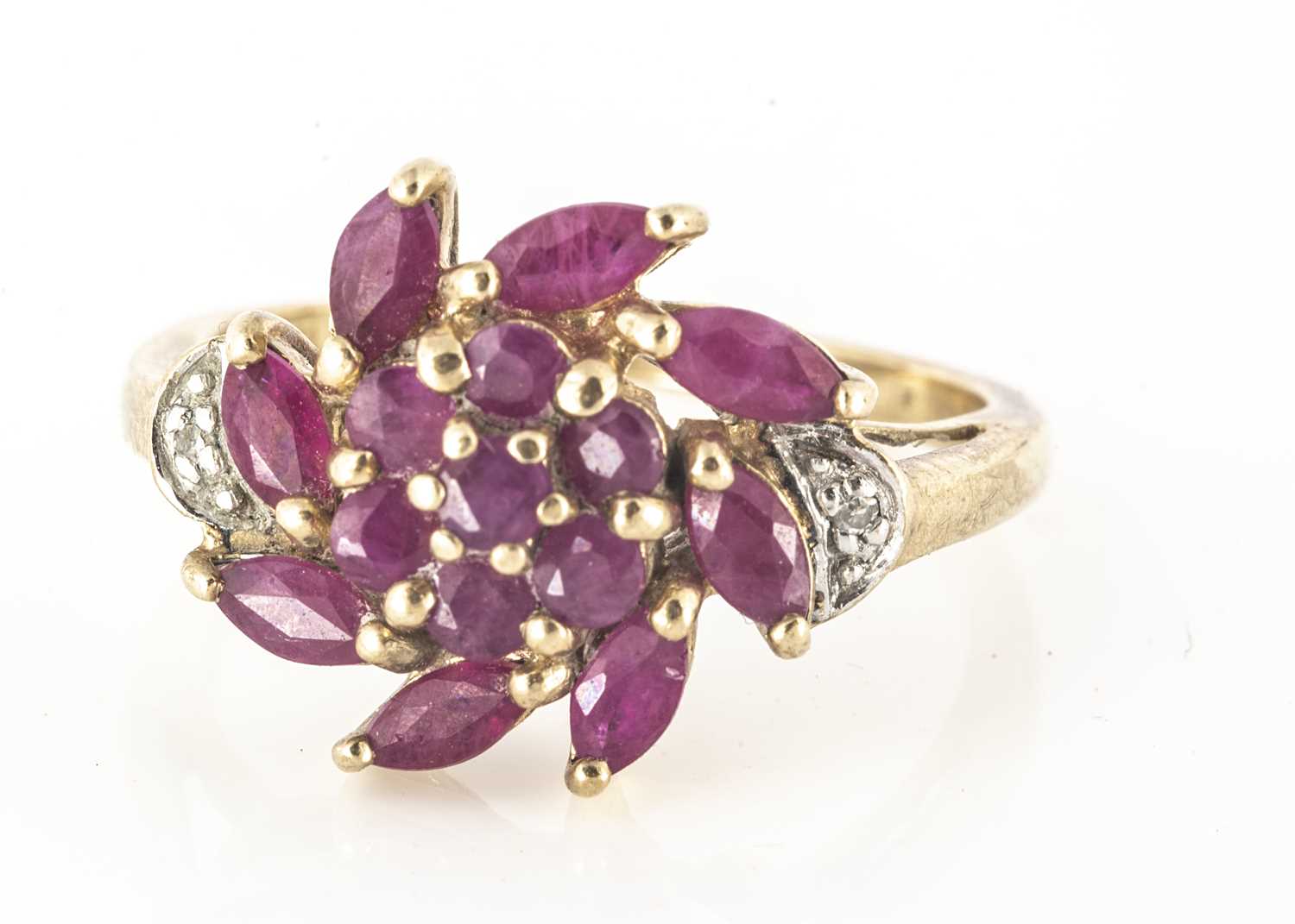 Lot 233 - A 9ct gold ruby and diamond floral dress ring