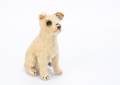 Lot 176 - A rare seated Steiff Fox terrier dog circa 1910, with complete white ear tag