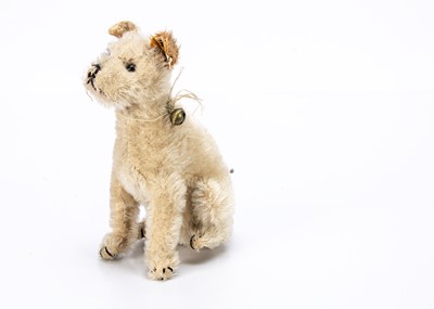 Lot 176 - A rare seated Steiff Fox terrier dog circa 1910, with complete white ear tag