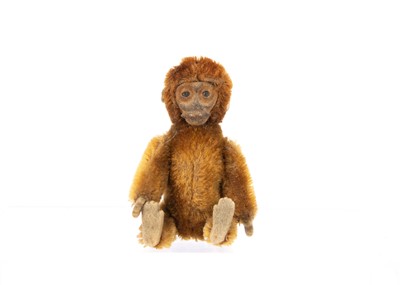 Lot 222 - A 1920s Schuco miniature monkey compact