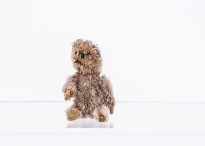 Lot 228 - A 1930s Schuco miniature lilac mohair teddy bear