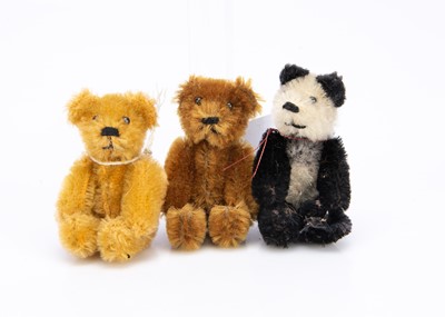 Lot 386 - Three post-war Schuco miniature teddy bears