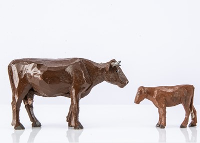 Lot 418 - A Forest Toys of Brockenhurst cow and calf