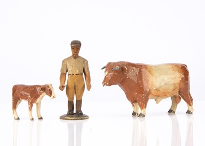 Lot 426 - A Forest Toys of Brockenhurst bull, stable boy and calf