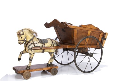 Lot 487 - An early 20th century English carved and painted wooden horse and cart