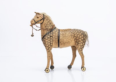 Lot 488 - A German brushed cotton covered pressed card toy horse 1910-20s