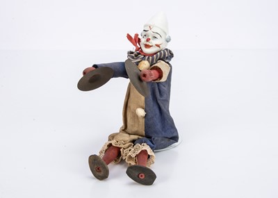 Lot 503 - A German bisque headed white faced clown toy