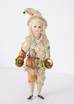 Lot 506 - A German bisque headed clown cymbalists toy