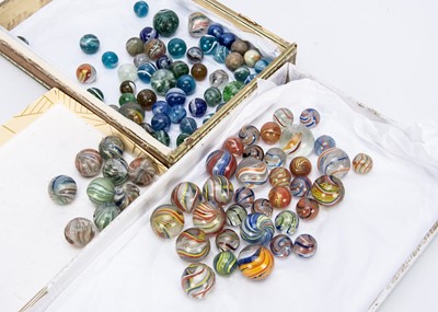 Lot 521 - A good selection of early handmade marbles