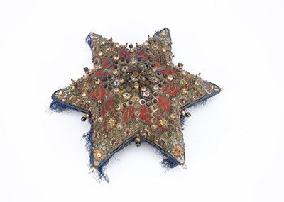 Lot 563 - A late 19th century unusual star shaped felt and pinned bead pin cushion