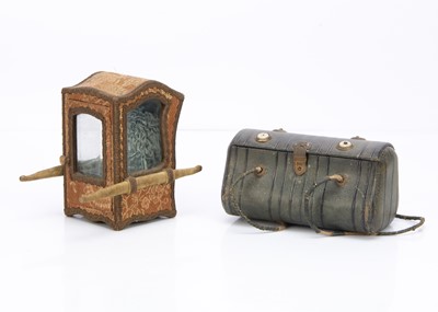 Lot 597 - An 19th century green leather sewing case