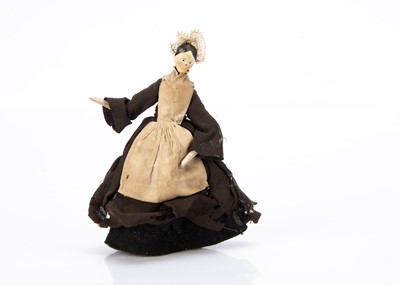 Lot 609 - An 19th century Grodnerthal painted wooden dolls’ house maid doll