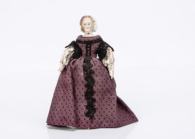 Lot 617 - An 19th century bisque shoulder-head dolls’ house doll