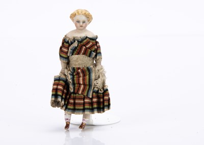 Lot 619 - An 19th century bisque shoulder-head dolls’ house doll