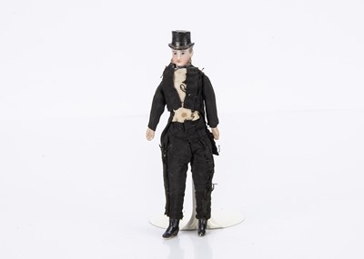 Lot 621 - An 19th century bisque shoulder-head male dolls’ house doll