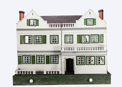 Lot 631 - A rare large Tri-ang wooden No.82 Tudor Mansion dolls’ house 1933-34