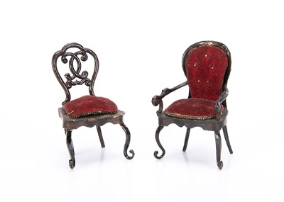 Lot 638 - Two 19th century Rock & Graner tinplate dolls’ house chairs