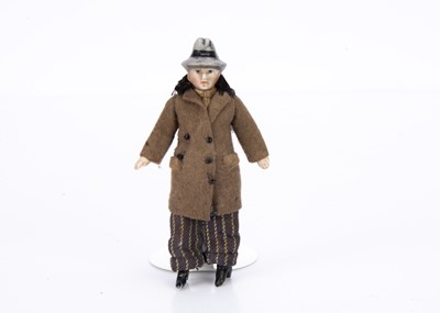 Lot 648 - A German all-bisque male dolls’ house doll in moulded trilby