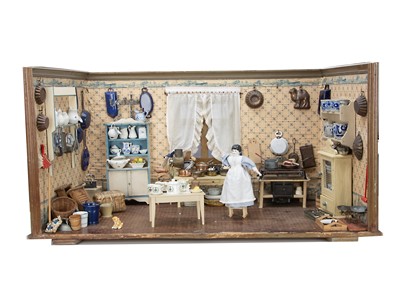 Lot 684 - A very large German wooden doll’s kitchen room setting