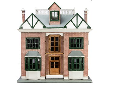 Lot 688 - A 1920-30s English wooden dolls’ house