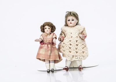 Lot 697 - Two German all-bisque dolls’ house dolls