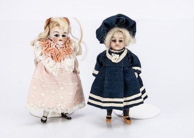 Lot 702 - Two German all-bisque dolls’ house dolls