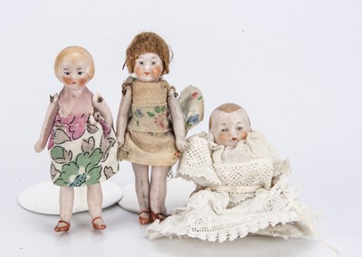 Lot 706 - Three German all-bisque dolls’ house dolls