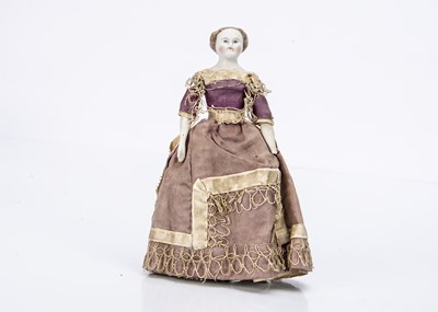 Lot 731 - A German bisque shoulder head dolls’ house doll in original dress